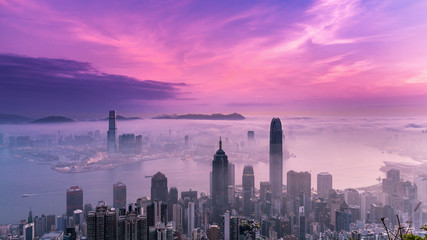 Misty City and Harbor at Sunrise - Victoria Harbor of Hong Kong