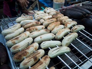 banana grill with charcoal on the iron