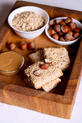 Fototapeta premium oat bars granola with hazelnuts and peanut butter, healthy snack