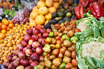 Naklejka na ściany i meble Vegetables and fruit on market counter