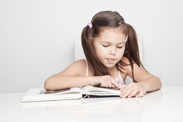 Girl writing in a notebook 