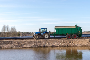 Fototapeta premium Tractor after work