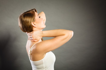 Naklejka premium Woman suffering from neck pain