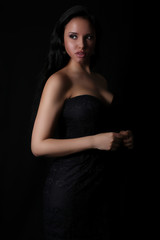 Beautiful woman wearing a black dress