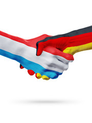 Flags Luxembourg, Germany countries, partnership friendship handshake concept.