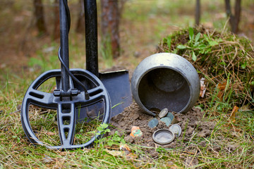 Search for treasure using a metal detector and shovel.