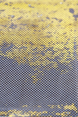 Cracked paint on metal grille