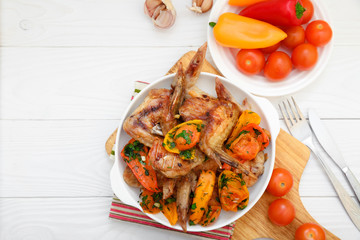 grilled chicken wings, peppers, tomatoes