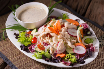 Fresh green salad with chicken and lettuce Fresh summer background Healthy eating