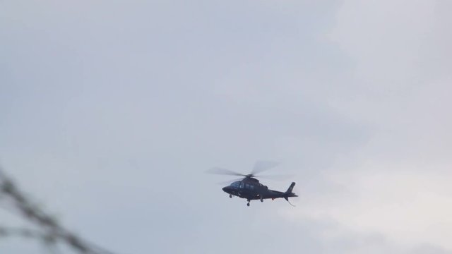 Black Hawk Helicopter Flying to Military Base