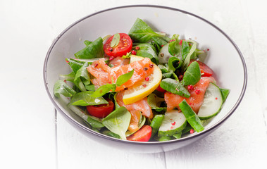 Fresh Salmon Salad. Healthy food concept.