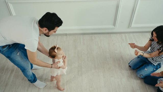 Family portrait. Baby's first steps