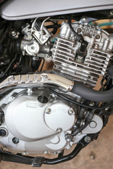 Close up of a motorcycle engine, abstract background. Grunge