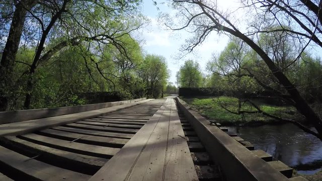 Wooden bridge on a small river