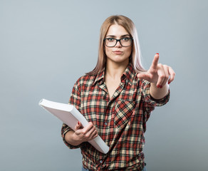 Young attractive woman hold book