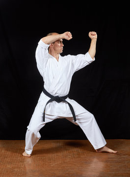 Athlete is training the techniques of karate