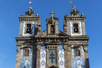 Fototapeta na wymiar Front view of Saint Ildefonso of Toledo Church in Porto, Portugal
