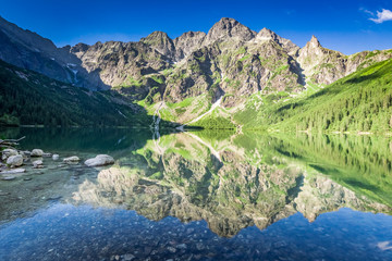 Obraz na płótnie Canvas Beautiful sunrise at lake in the Tatra Mountains, Poland, Europe