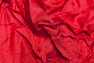Red cloth waves background texture