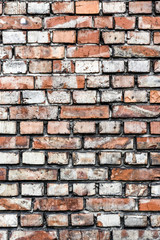 Colorful irregular brick wall texture or background.