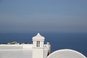 Seaview with white house in foreground
