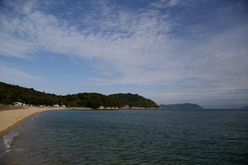 Fototapeta premium Sandy beach and blue sky