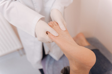 Skillful trained rheumatologist hitting right spots