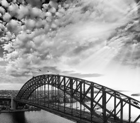 Black and white sunset aerial view of Sydney Harbour Bridge, NSW - Australia