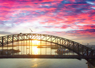 Sydney Harbour Bridge at sunset, view from the sky