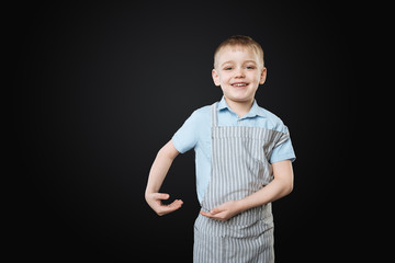 Delighted child imagining that he has pan