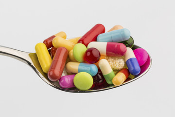 many tablets on spoon