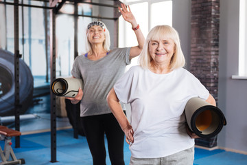 Happy senior women enjoying their time in fitness club