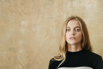 teen girl with pretty face and long blonde hair
