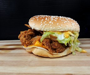 Burger on wooden board