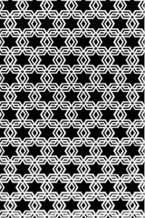 Luxurious white wooden stencil star pattern wall interior contemporary on black background.