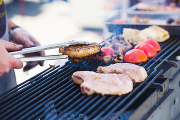 Street food festival, delicious grilled vegetables and steak