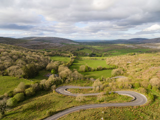 Epic Aerial view of the beautiful Irish countryside nature landscape from the Burren national park in County Clare Ireland