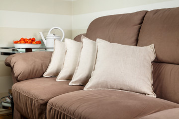 pillows spread out on the sofa