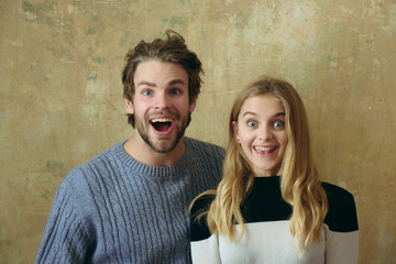 happy couple of man and woman on beige background