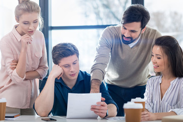 group of young business people discussing new project on meeting