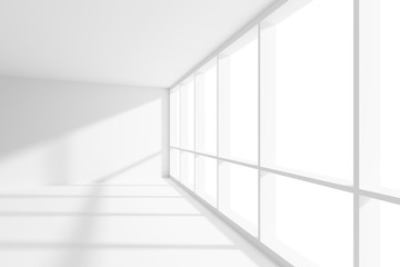 Empty white room with sunlight from large window.