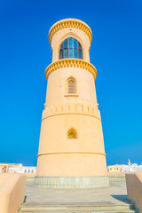 View of a lighthouse in the Omani town Al Ayjah. © dudlajzov