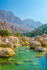 Lagoon with turqoise water in Wadi Tiwi in Oman.