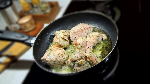 Pan frying pork meat on the stove time lapse stock video 
