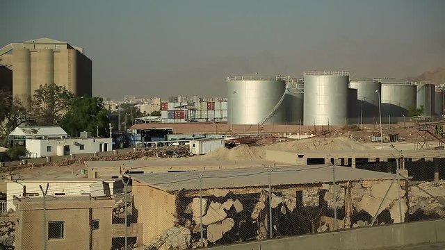 Large capacity tanks in industrial area near port terminal in Aqaba, Hashemite Kingdom of Jordan
