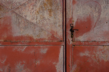 Detailed view of an old metal fence, which succumbed to corrosion.