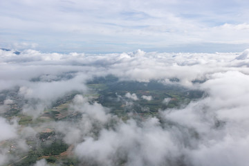 Aerial View of Village landscape and River over Clouds in Chiangdao Thailand
