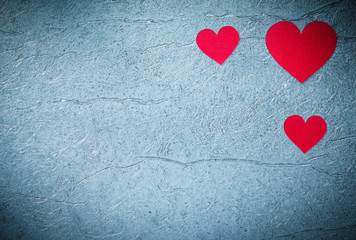 Red hearts on metallic background Valentine card
