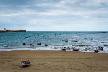 Fototapeta na wymiar Low tide at the beach in Cadiz, Spain
