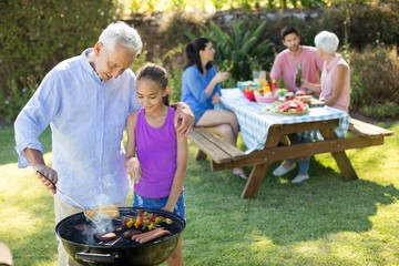 Family preparing barbecue 